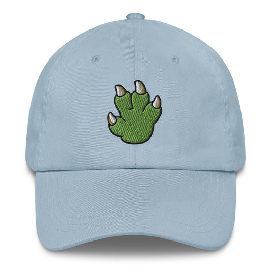 Light blue baseball cap with pixel art green dinosaur paw embroidery, playful dad hat